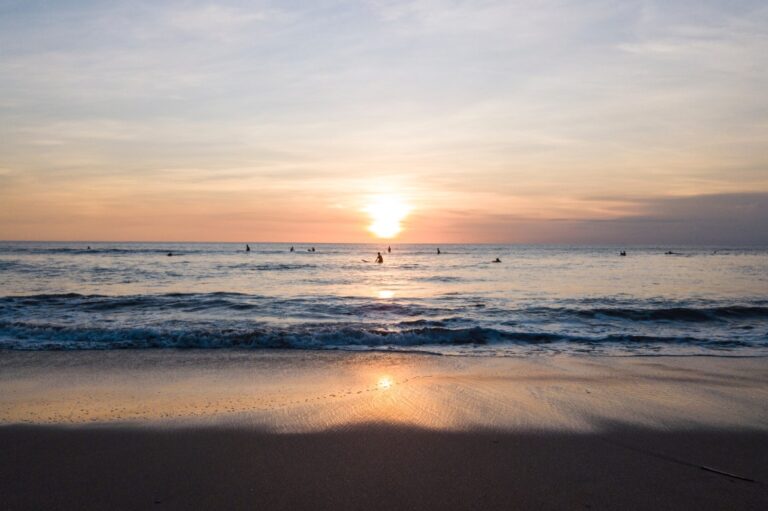 Sunset over the sea seen from the beach