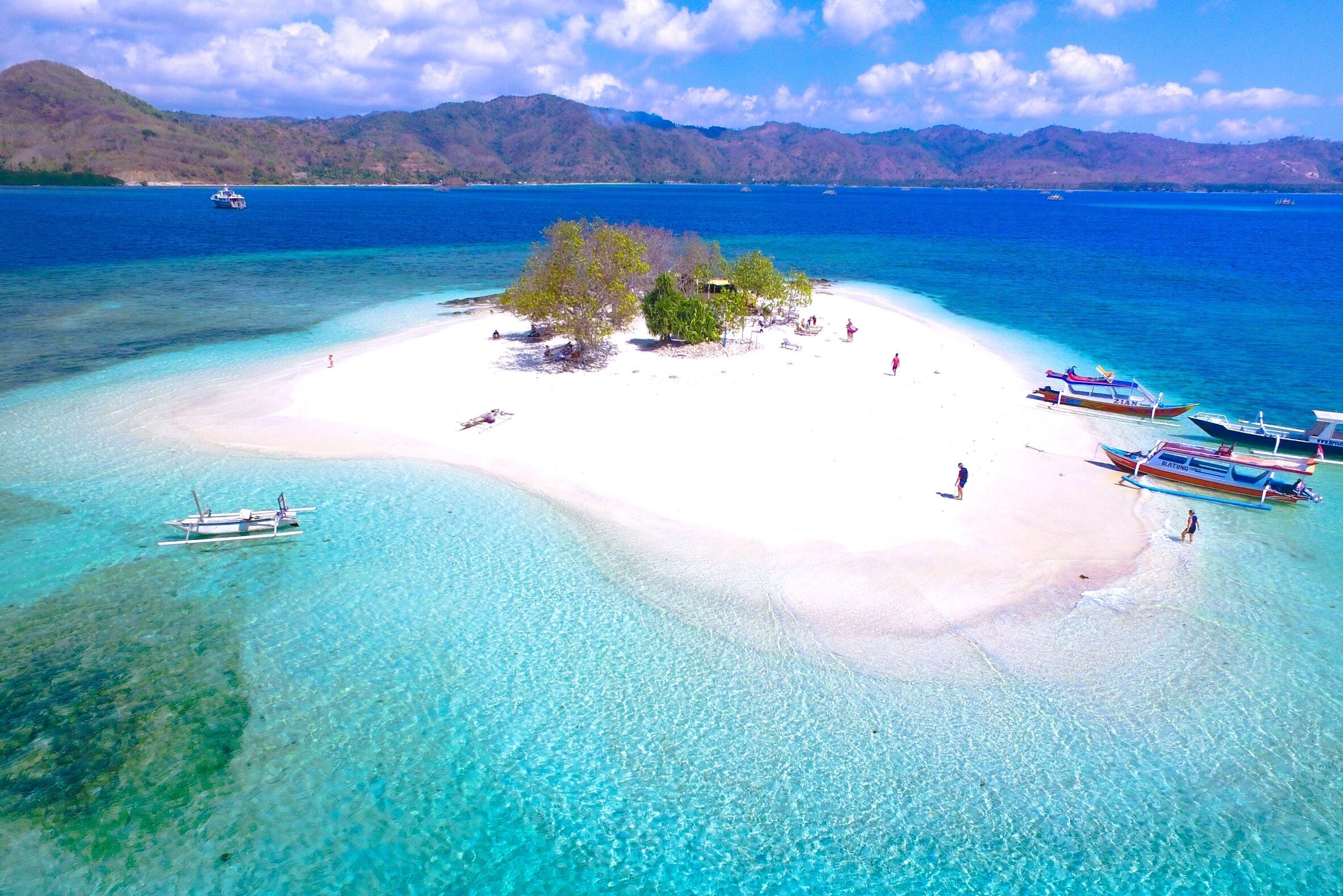 Beautiful Blue Clear Water and white sand, Aerial Gili Kedis turquoise water in Lombok, Indonesia.